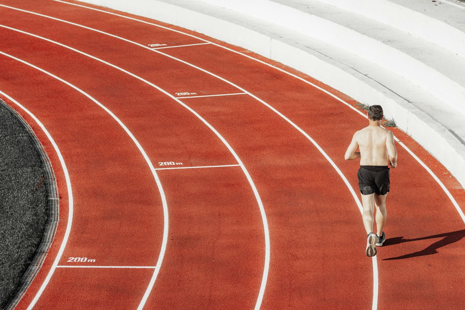 Athlete running the curve
